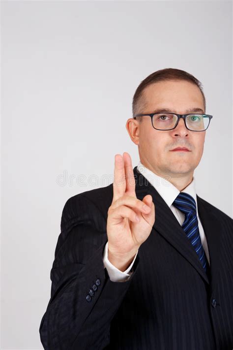 Businessman Pointing Gesture With Two Fingers Raised Together Stock