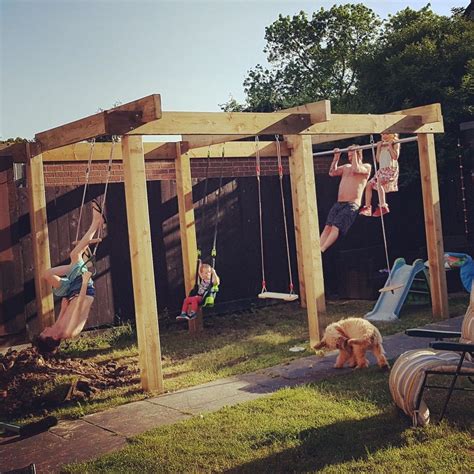 Yard swings accent your garden bed, nicely. Our garden pergola / climbing frame with swings, monkey ...