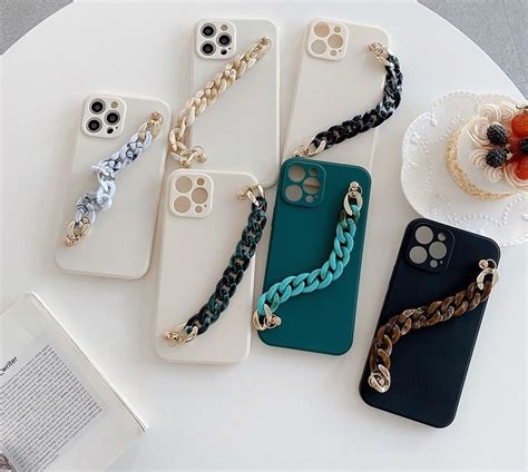 This Marbled Chain Strap Handle Phone Case Is Ultra Clean Edgy