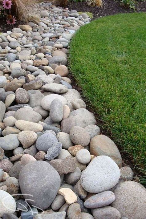 Gone are the voluminous shapes and profusion of colours. 48 Outstanding River Rocks Design Ideas For Front Yard ...