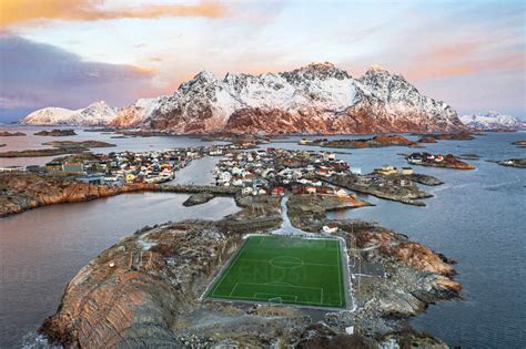 Aerial View Of Soccer Stadium And Henningsvaer Village During Winter
