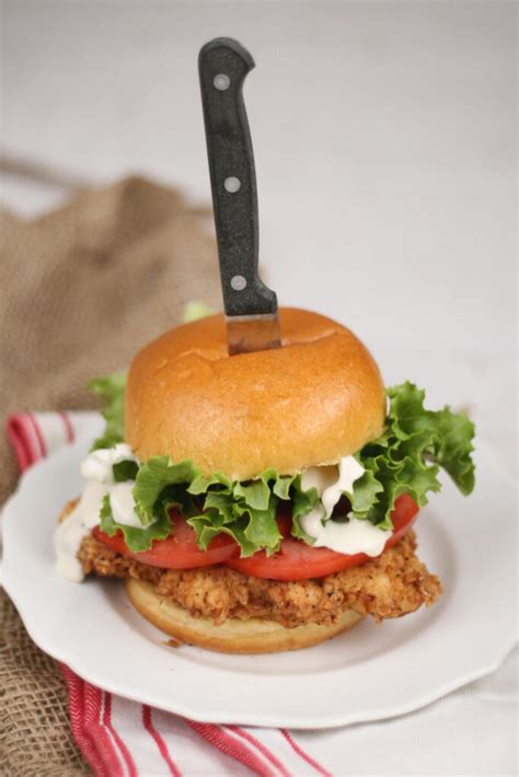 The secret to this juicy and tender country fried chicken lies in the simple buttermilk marinade with a hint of thyme. Buttermilk Fried Chicken Sandwiches | A Farmgirl's Kitchen