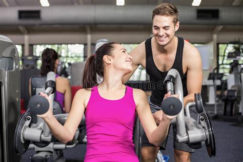 Trainer Man Helping Athletic Woman Stock Photo Image Of Leisure