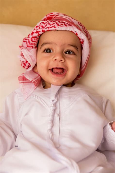 Arabic Twin Boy Being Photographed At Home In Dubai Cutebaby