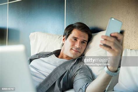 Guy Taking Selfie Bed Alone Photos Et Images De Collection Getty Images