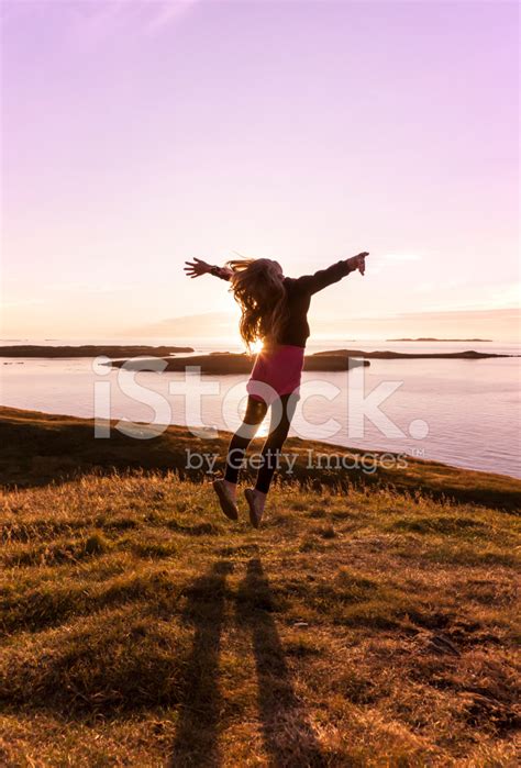 Girl Dancing In The Sunset Stock Photo Royalty Free Freeimages