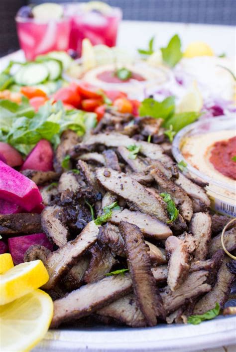 Slice chicken and pile onto platter alongside flatbreads, salad and the yoghurt sauce. Grilled Lamb Shawarma Platter Recipe • Two Purple Figs