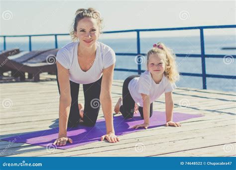 Mother And Child Doing Sports Outdoors Stock Photo Image Of Daughter