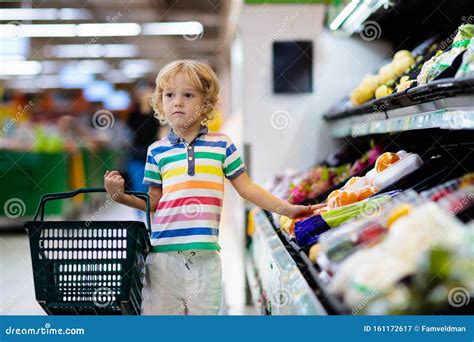 Child In Supermarket Kid Grocery Shopping Stock Image Image Of
