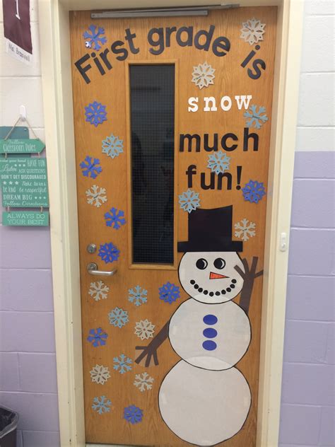 A Classroom Door Decorated With Snowmen And The Words First Grade Is