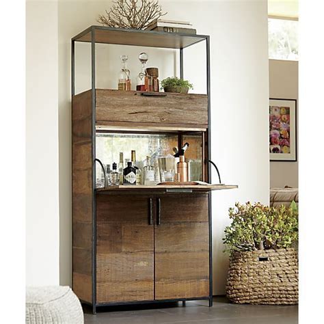 This bar cabinet with wine storage holds up to 18 bottles of wine. Clive Bar Cabinet - Crate and Barrel | Living rooms, Nooks ...