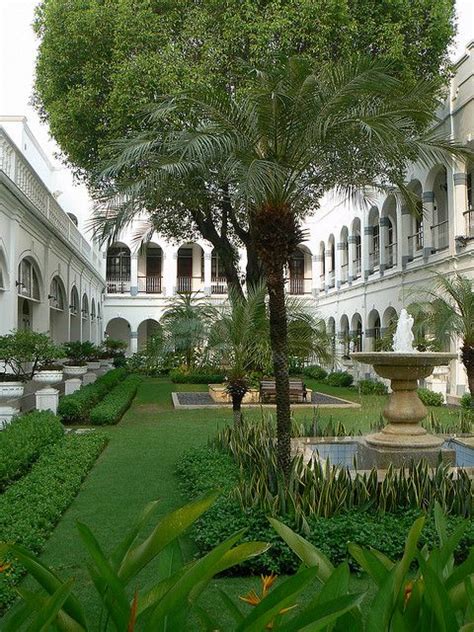 Gardens and courtyard at the Hotel Majapahit Surabaya ...