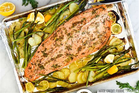 Season salmon with salt and pepper. Oven Baked Seafood | How to Cook Seafood in the Oven