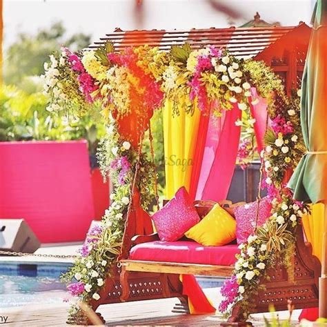 15 Vibrant Jhoola Swing Decor Ideas To Beautify Your Mehndi Ceremony