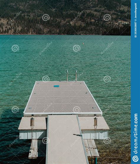 Dock Over Turquoise Lake Water In Bc Stock Image Image Of Climate