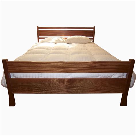Mahogany finishing with details in leather cat. Hand Made Modern Mahogany Bed by SpenchCraft | CustomMade.com