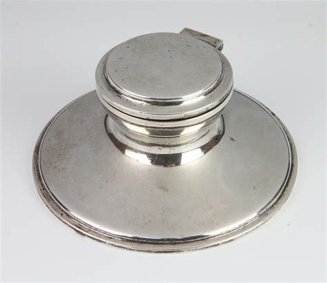 A Silver Capstan Inkwell Of Plain Form 12cm 16th November 2022 Denhams