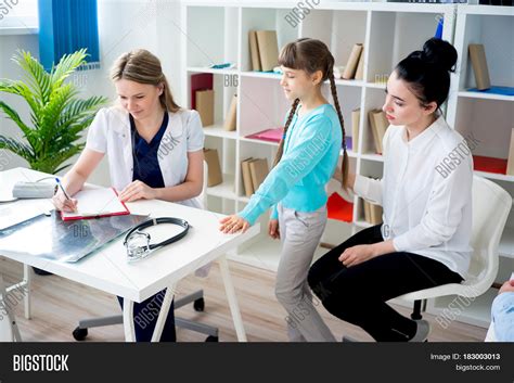 Doctor Examining Girl Image And Photo Free Trial Bigstock