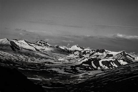 Grayscale Photo Of Snow Covered Mountain · Free Stock Photo