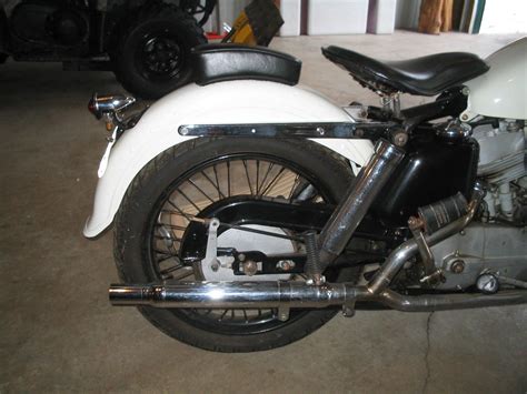 It stands on a plate with model name. 1952 Harley Davidson Model K Motorcycle very early serial