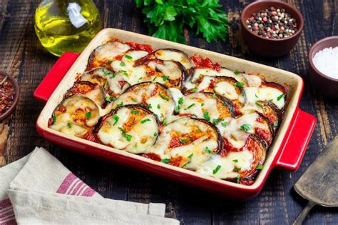 Premium Photo Baked Eggplant With Cheese Mozzarella And Tomatoes