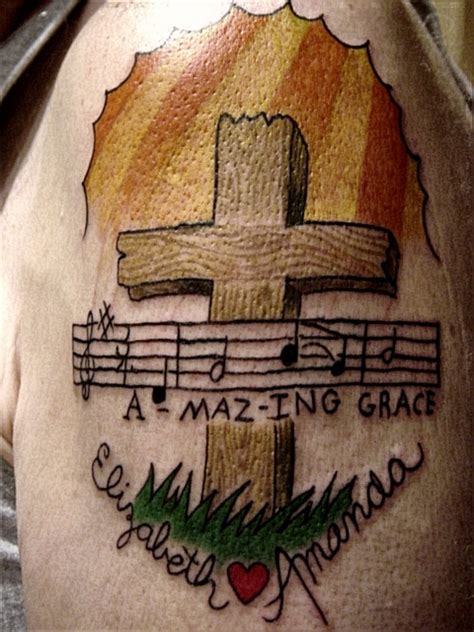 Is it blood or just a splash of paint, it's hard to tell. Cross And Music Tattoo Picture - Tattoo Maze