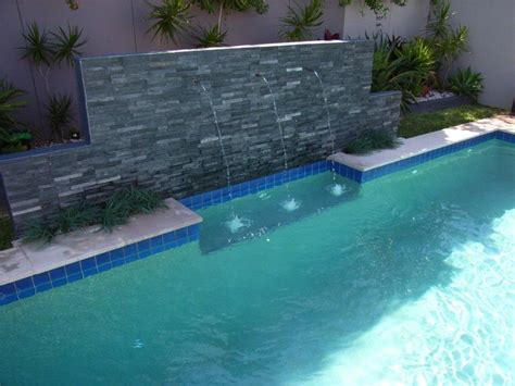 Stunning Inground Pool Waterfall Kits With Travertine Tile Pool Coping