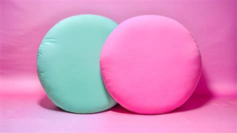 Premium Photo A Pink And Green Blue Bean Bag Sits On A Pink Background