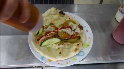 · homemade, veggie filled falafel, combined with turmeric infused golden rice, all stuffed inside fresh naan and topped with a special sauce. Buying the cheapest Falafel / Naan wrap in London (& the ...