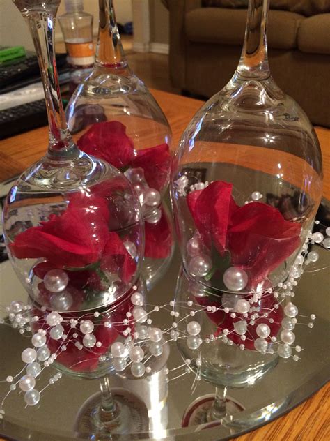 Pearl Themed Wedding Centerpiece Upside Down Wine Glasses Candles And Flowers Glass Wedding