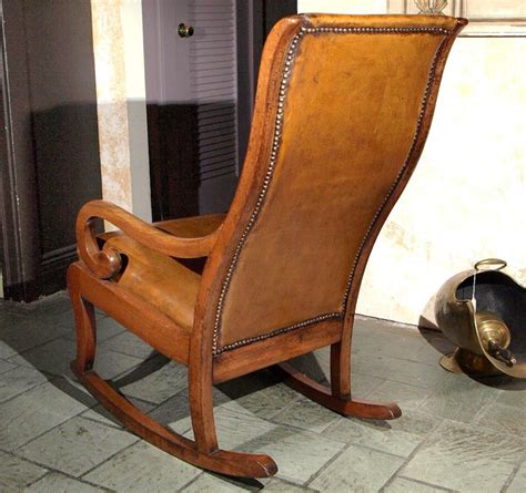 Exceptional 19th c antique ladies slipper or nursing rocker mahogany cane. Antique English Regency mahogany leather rocking chair at 1stdibs