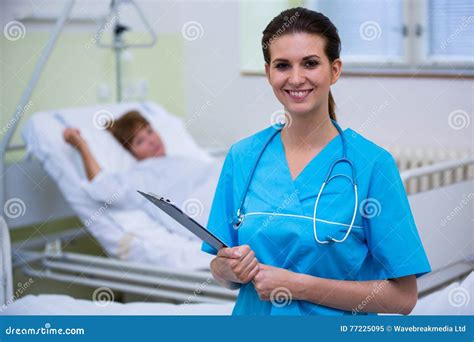 Nurse Holding A Clipboard Stock Image Image Of Medical 77225095