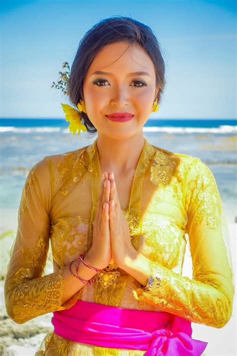 bali indonesia march 11 2017 beautiful woman in thai traditional dress in the beach of