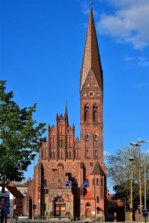 Spire Of St Albans Church In Odense Denmark Encircle Photos