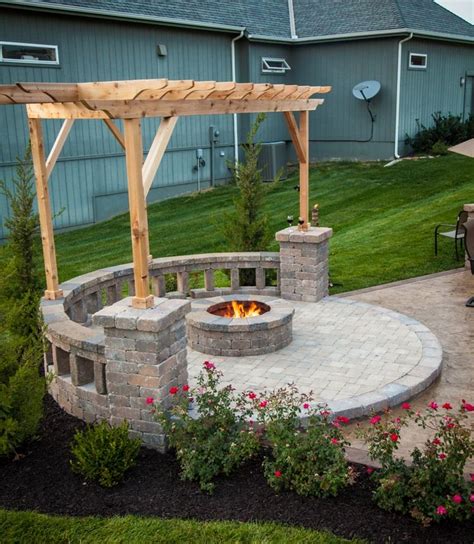 You also need to confirm that the ceiling height, ventilation, location, and flooring of your outdoor space meet the manufacturer's requirements, prior to installation. Fire pit with built-in seating, covered by a pergola. Nice ...