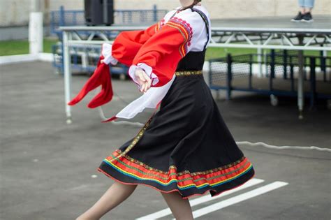 Premium Photo A Girl Dances Russian Folk Dance Performance Of A Girl With A Folk Dance On The
