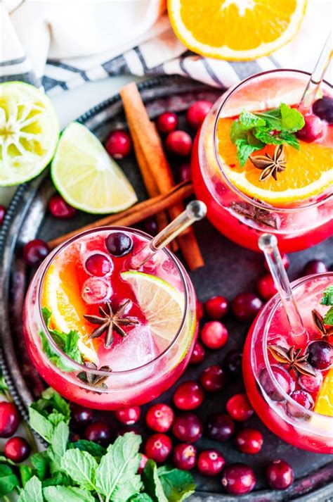 Sometimes the best way to celebrate bourbon is with a great bourbon punch. Cranberry Mule Holiday Cocktail | Recipe | Holiday cocktails, Christmas drinks, Thanksgiving drinks