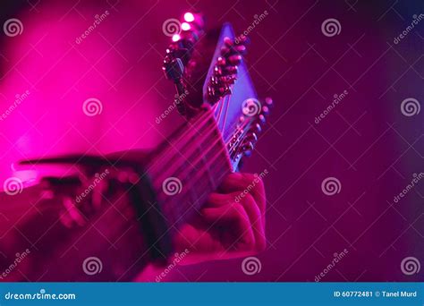 Artist Tuning A Six String Acoustic Guitar Stock Image Image Of Close