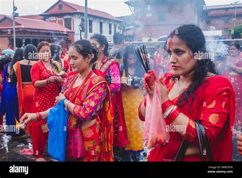 kathmandu nepal sep 2 2019 hindu women offer prayers at the pashupatinath temple during teej