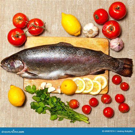 Fresh Raw Fish And Food Ingredients On Table Stock Photo Image Of