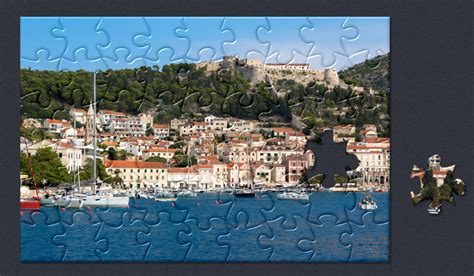 Stats show puzzles played = 672, puzzles completed = 536, collections completed =3. Puzzle of Hvar, Croatia from the Microsoft Jigsaw Travel ...