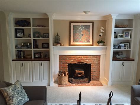 Next i started installing the shiplap to the wall, starting at the top and going down. Bookcases and mantle | Fireplace built ins, Home, Home decor