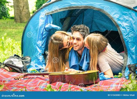 Group Of Best Friends Having Fun Camping Together Outdoors Stock Image