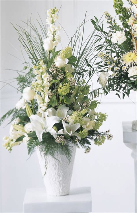 Lilies the flower most commonly associated with funeral services in the popular mind is the lily. Weeping Lilies Arrangement - modern-funeral-flowers ...