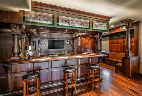 Home bar cabinetry enhances your home entertainment space while storing and displaying your wine collection; Custom Cabinets Colorado: Tips for Stocking Your Home Bar