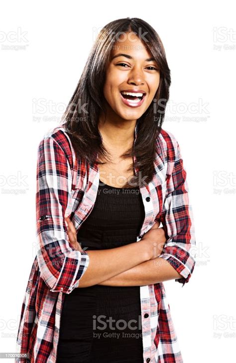 Cute Brunette Teenager Laughing With Arms Crossed Stock Photo