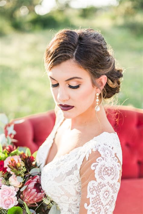 Romantic Bridal Style Dramatic Wedding Makeup Bold Lashes Burgundy Lipstick Up Do Wedding