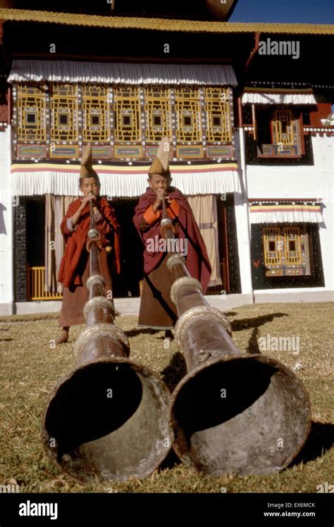 Colour Photograph Of Lama Boys With Silver Gyalings Sikkim