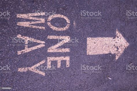 One Way Sign Painted On Walkway Sideways View Stock Photo Download