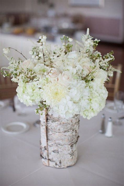 This stunning arrangement is sure to steal the scene. 26 Ideas to Rock Your Winter Wedding with Birch Centerpieces